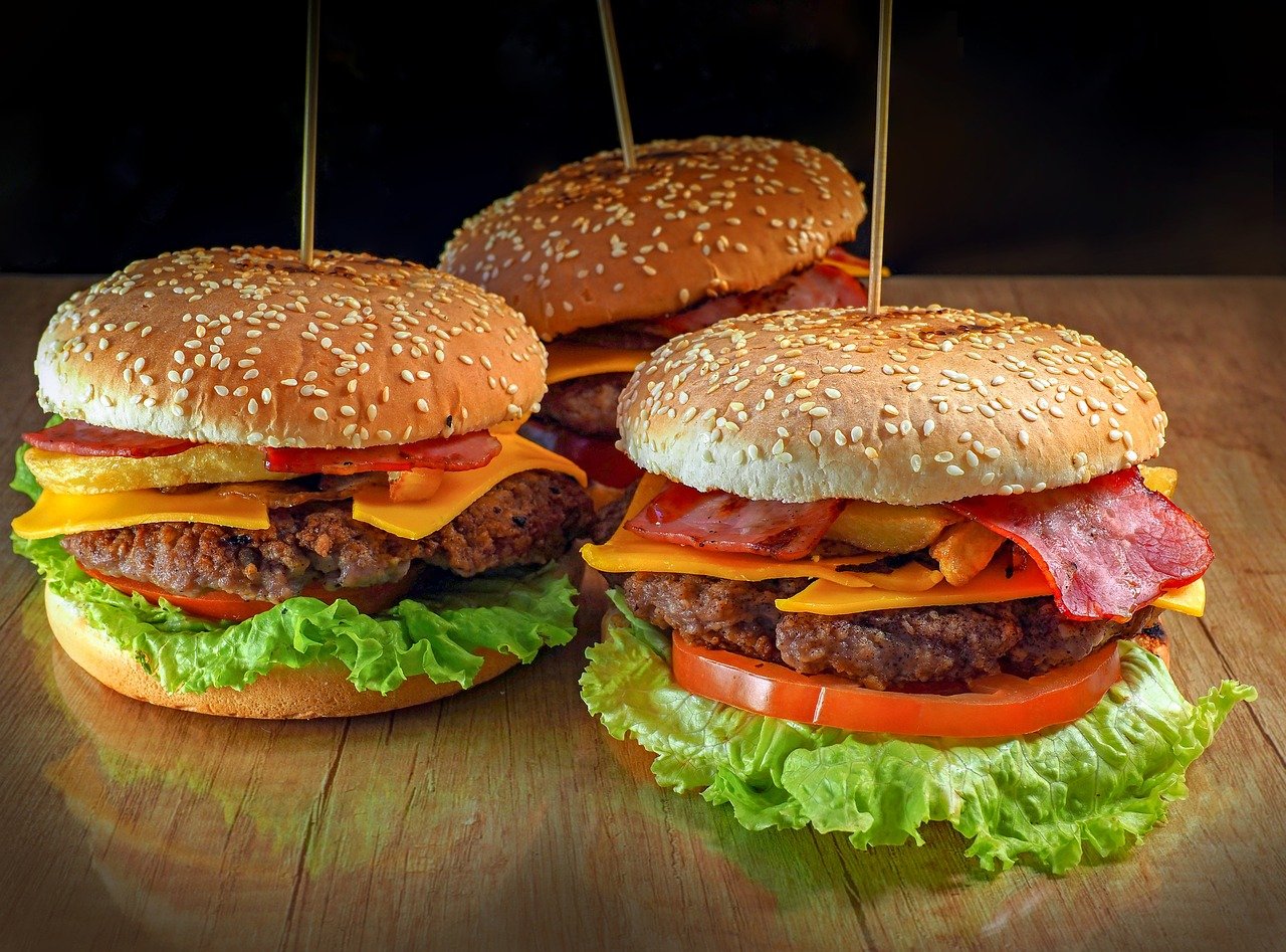 a group of burgers on a table